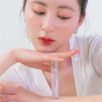 Son bóng nhũ Romand Glasting Water Gloss 00 Meteor Track – Thêm lấp lánh, Tăng căng mọng
